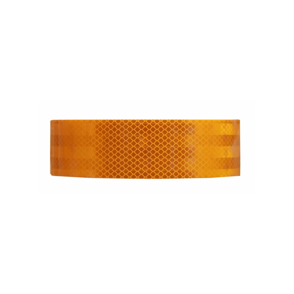 Side view of yellow reflective tape showing the diamond grid pattern across the 50mm face