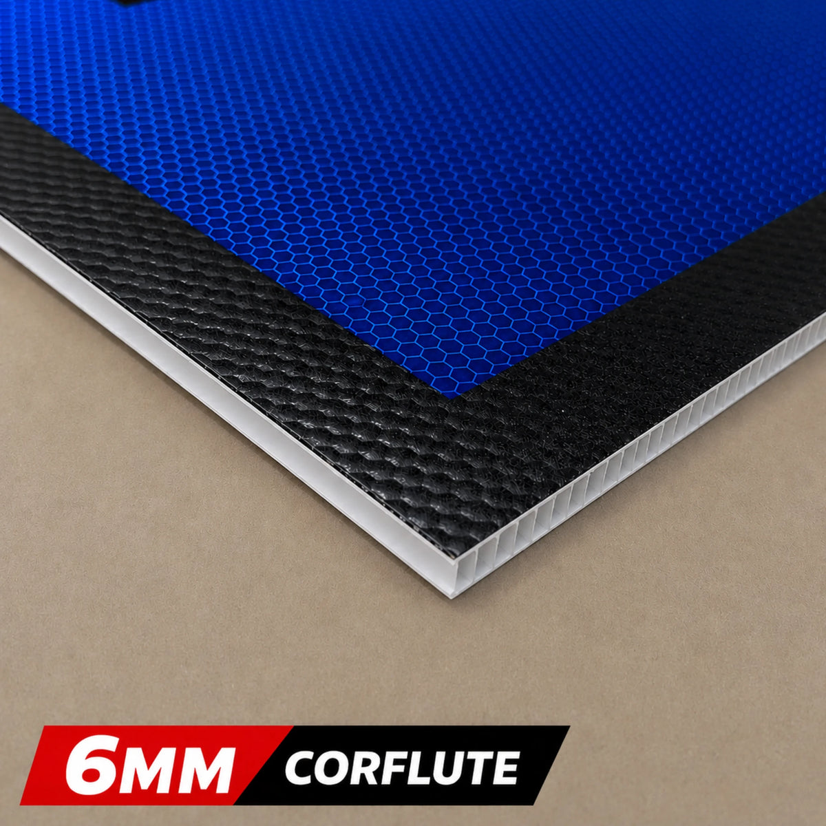 6MM Corflute sheet with blue, black, and white layers on a beige background