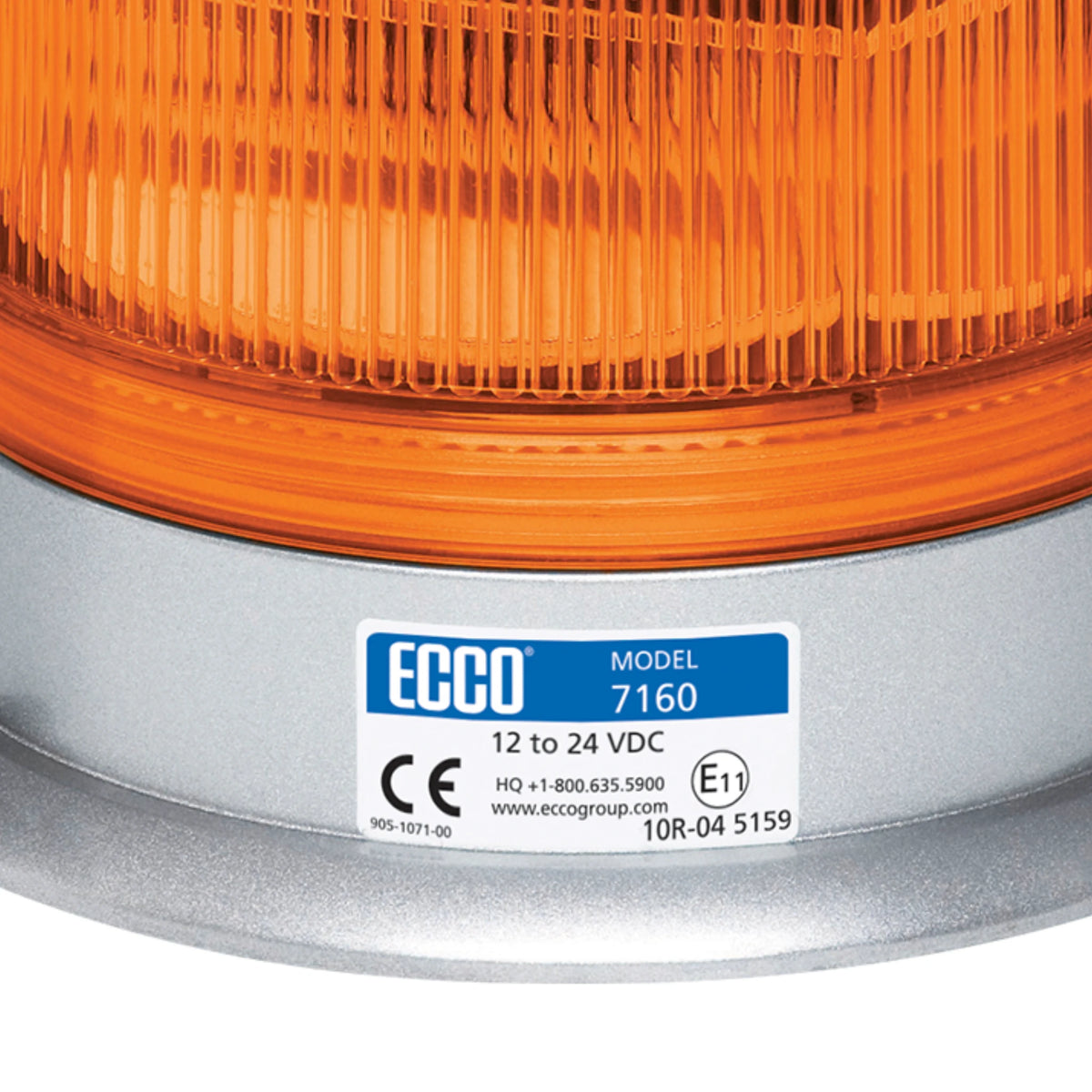 Close-up of the ECCO 7160 beacon base label showing model 7160, 12 to 24 VDC rating, CE mark and E11 approval mark