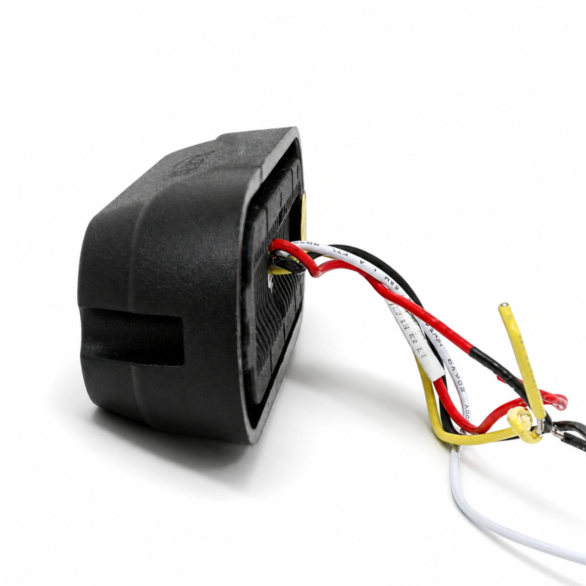 End view of the LED warning light head showing the four core wiring loom in red, black, white and yellow leaving the rear of the housing