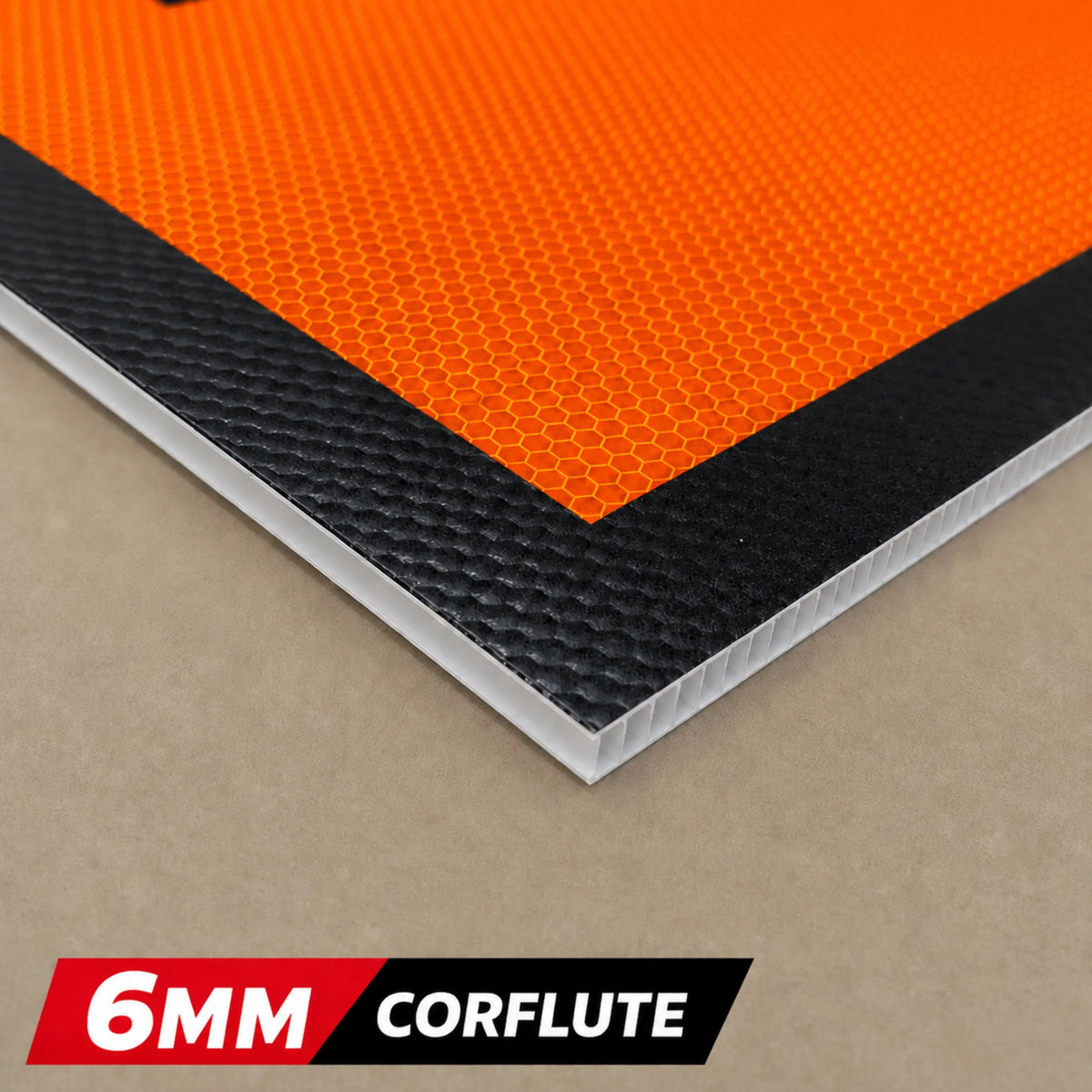 6MM Corflute sheet with fluorescent orange and black border, on a beige background
