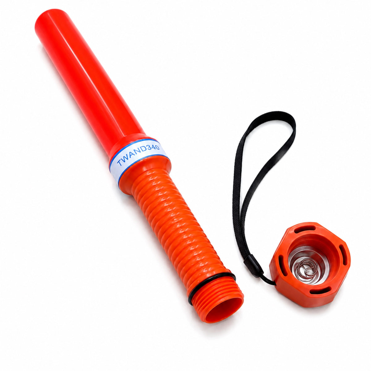 Orange LED marshalling wand with the end cap removed, showing the open battery compartment and spring terminal