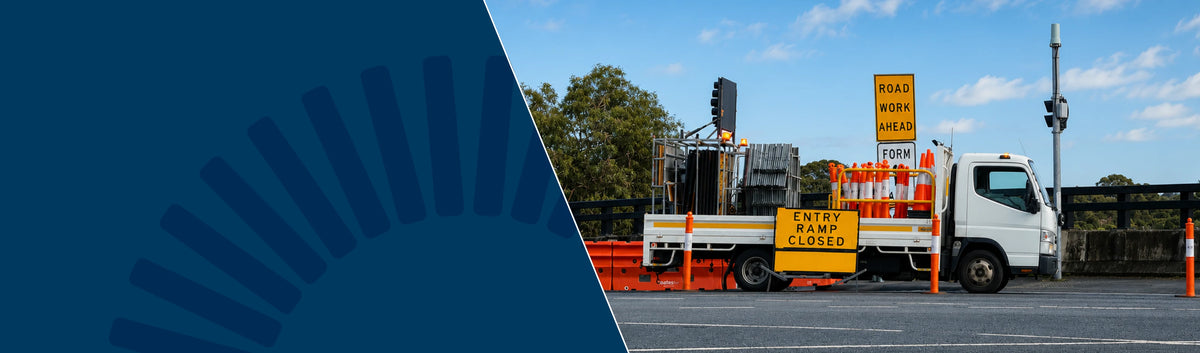 uag logo traffic truck on bridge
