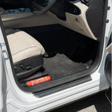 FSS100 fire suppression stick stored beside the seat in a vehicle door footwell