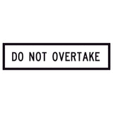 Do Not Overtake GM9-90B 1200x300mm corflute sign panel with black uppercase legend and border on white reflective background