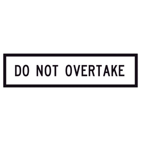 Do Not Overtake GM9-90B 1200x300mm corflute sign panel with black uppercase legend and border on white reflective background