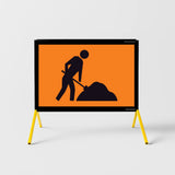 Construction work sign with a person and pile of rubble on an orange background, mounted on a yellow stand.