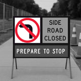 Road sign indicating 'No Right Turn', 'Side Road Closed', and 'Prepare to Stop' on a road.