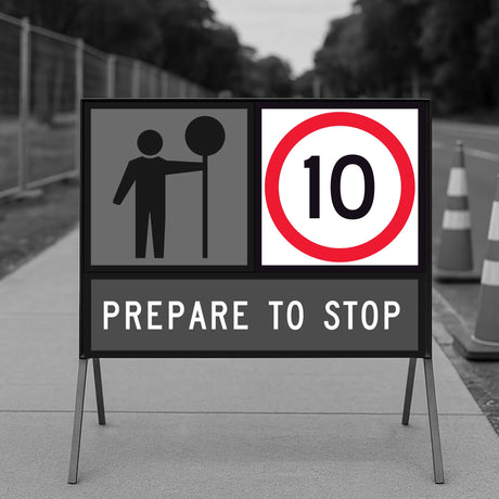 Road sign indicating a speed limit of 10 km/h with a traffic controller symbol, on a road with traffic cones.