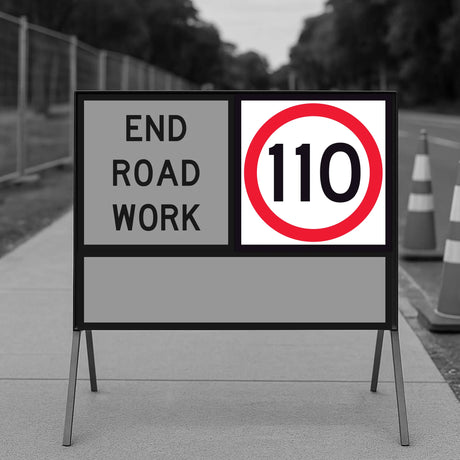 temporary traffic road sign indicating 'End Road Work' with a speed limit sign showing '110'.