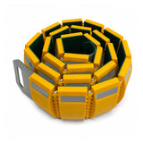 Portable rollout speed bump rolled into a compact coil for transport and storage