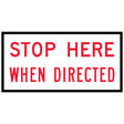 TM1-35C Stop Here When Redirected 1200x600mm corflute sign panel with red uppercase legend and black border on white retroreflective background