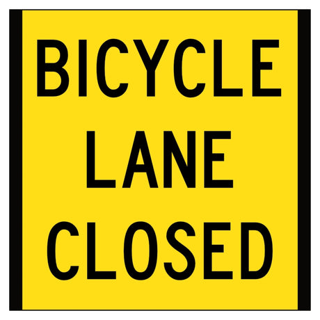 Yellow sign with black text 'BICYCLE LANE CLOSED' on a white background