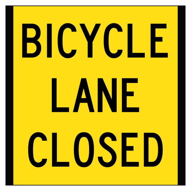 Yellow sign with black text 'BICYCLE LANE CLOSED' on a white background