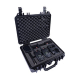 Black hard-shell case with foam interior containing electronic devices on a white background