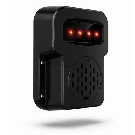 Black VDA001 vehicle direction alarm with four amber LEDs lit above the speaker grille