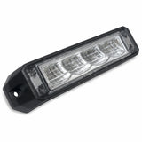 Angled view of the LED warning light head from the end, showing the mounting lug and screw hole alongside the four reflector cells