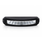 Front view of the curved black LED warning light head showing the full row of nine clear reflector cells