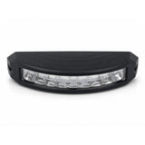 Front view of the LED warning light head from slightly below, showing the curve of the lens across its length