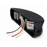 Angled rear view of the LED warning light head showing the aluminium base, moulded cable channel and the four core wiring loom leaving the housing