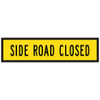 Side Road Closed TM1-32B 1200x300mm corflute sign panel, black SIDE ROAD CLOSED legend on yellow retroreflective background with black border