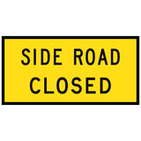 Side Road Closed TM1-32C 1200x600mm corflute sign panel, black SIDE ROAD CLOSED legend over two lines on yellow retroreflective background with black border