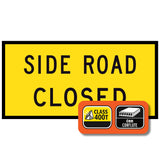 Side Road Closed TM1-32C 1200x600mm corflute sign panel with spec badge showing Class 400T sheeting and 6mm corflute