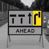 lane status road sign with traffic symbols and 'AHEAD' text on a gray background