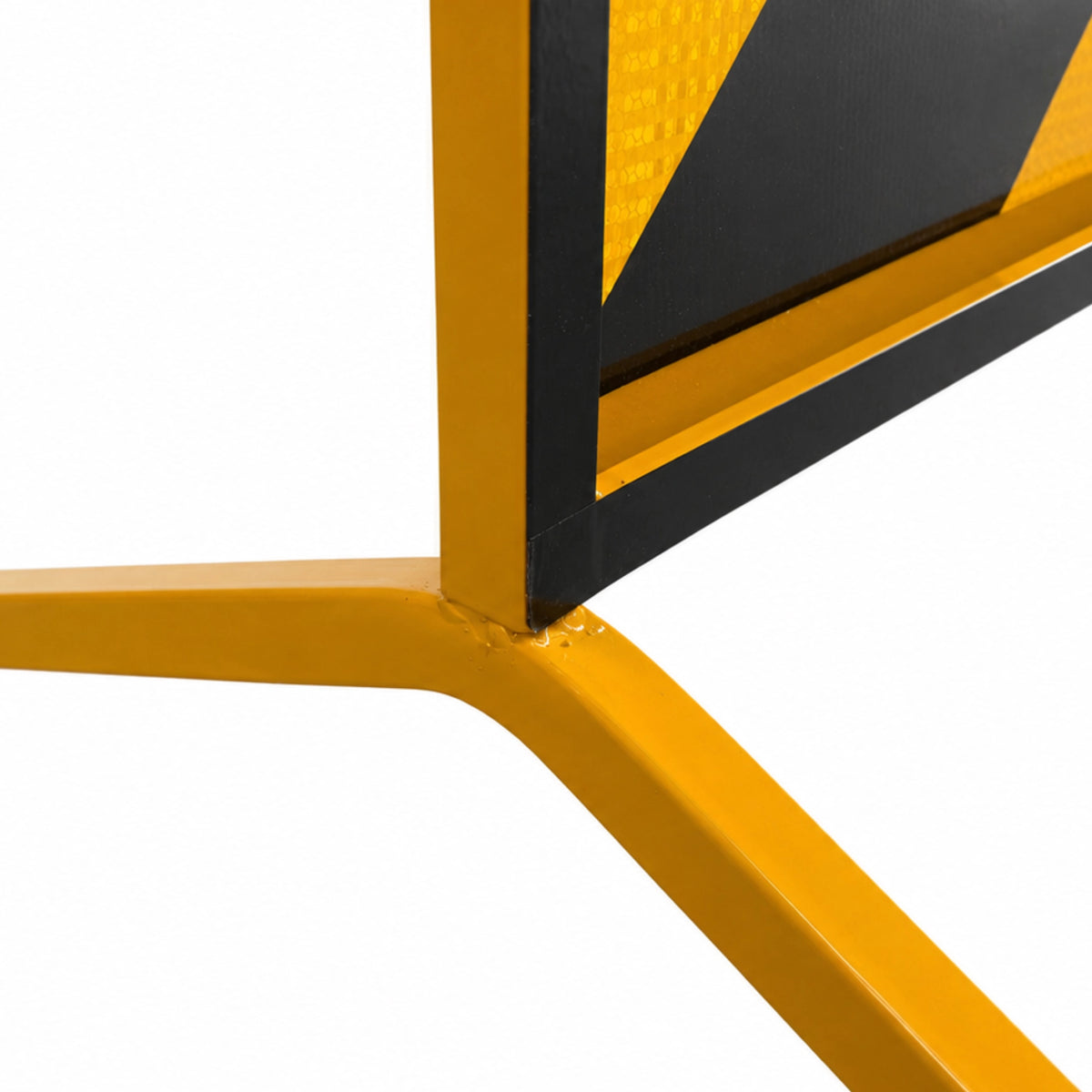 Close-up of the boxed edge chevron sign frame showing the slot with the yellow metal leg inserts into the heavy duty yellow frame.