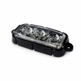 F3 9W mini LED warning light head viewed from above in its aluminium housing, showing the three TIR optics and the two outer mounting holes