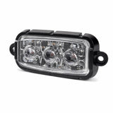 F3 9W mini LED warning light head seated in its black aluminium housing, three quarter view showing the clear TIR lens