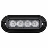 Front view of the black oval surface mount LED warning light head, four clear TIR lens cells behind a flush lens with a screw mounting ear at each end