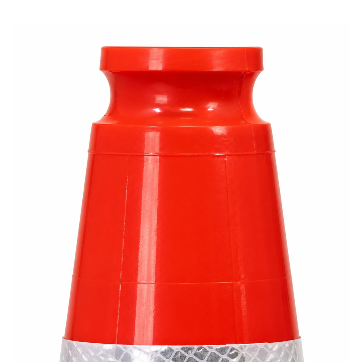 Upper section of the orange traffic cone showing the indent handle grip used for pickup and placement