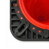 Underside corner of the traffic cone base showing ribbed black PVC construction and rubber foot pad
