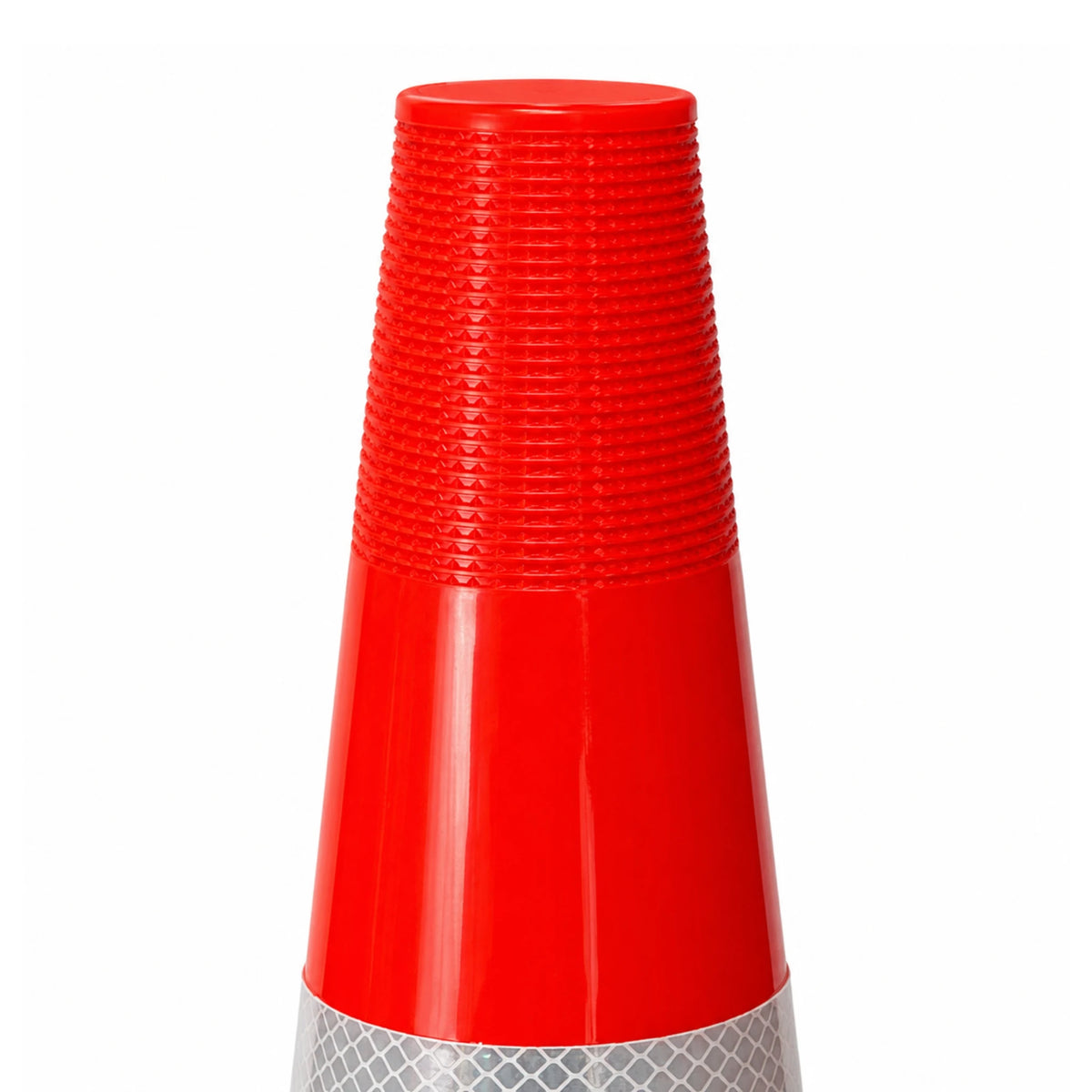 Ribbed hand grip section at the top of the orange 900mm traffic cone used for pickup and placement