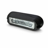 Angled view of the black LED warning light head showing the clear linear lens window set into the raised housing
