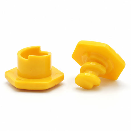 Yellow SupaGrip SafeKerb replacement connector shown as two parts, the hexagonal socket base with slotted collar and the hexagonal capped stem