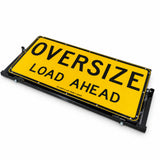 Oversize Load Ahead sign folded flat in its stowed position for travel