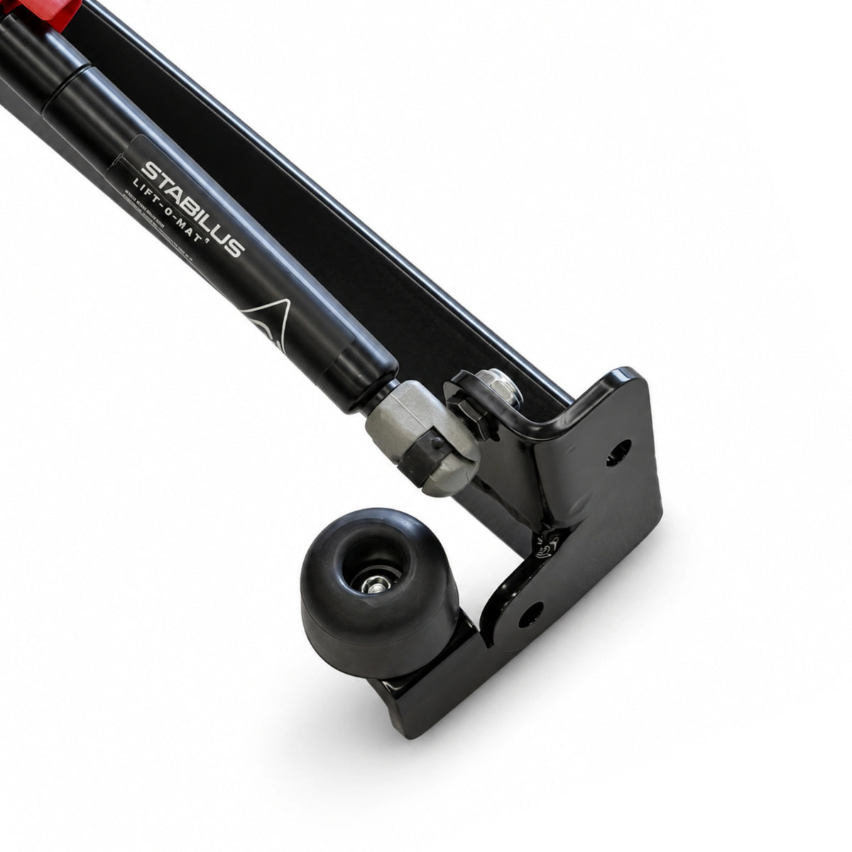 Close-up of the gas strut and rubber stop at the end of the sign base frame