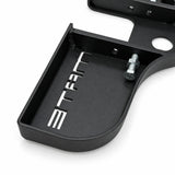 Close-up of an M10 locking bolt and nut in the side wall of the black Stepmate towbar step