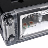 Close-up of one TC4 reflector cell showing the two LEDs sitting side by side, one for each output colour, with the ECE approval markings moulded into the lens