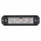 Front view of a black surface mount LED warning light head with four clear reflector cells and a screw fixing lug at each end