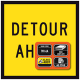 Detour ahead sign with certification logos on a yellow background