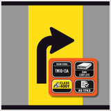 TM10-13A Safety sign with a black arrow on a yellow background and additional information on an orange rectangular panel.