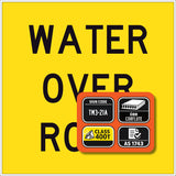 Water Over Road TM3-21A 600x600mm corflute sign panel with black WATER OVER ROAD text and border on yellow retroreflective background