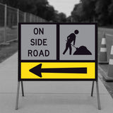 Horizontal Arrow TM5-8B long directional arrow corflute panel fitted below ON SIDE ROAD and Worker symbol panels in a multi-message sign frame on a footpath, indicating the direction of roadwork on a side road
