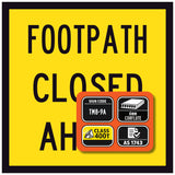 Warning sign indicating 'Footpath Closed ahead' with additional certification details on a yellow background.