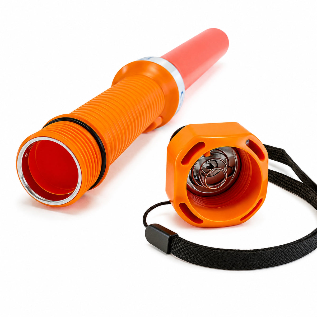 Orange LED marshalling wand with the end cap detached, showing the battery spring terminal and internal threading