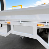 Hino 300 truck with two amber U30-12A light heads flashing on the front grille