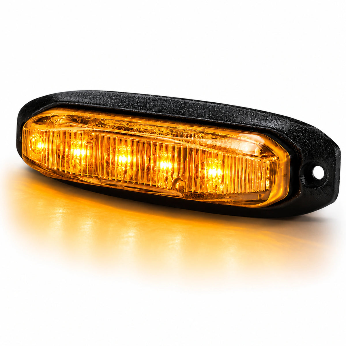 X6 18W LED warning light head, amber variant, angled view of the unlit clear lens and black housing